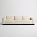 Trzyosobowa sofa z ekoskóry PU kremowa z czarną podstawą, 240 x 95 x 75 cm