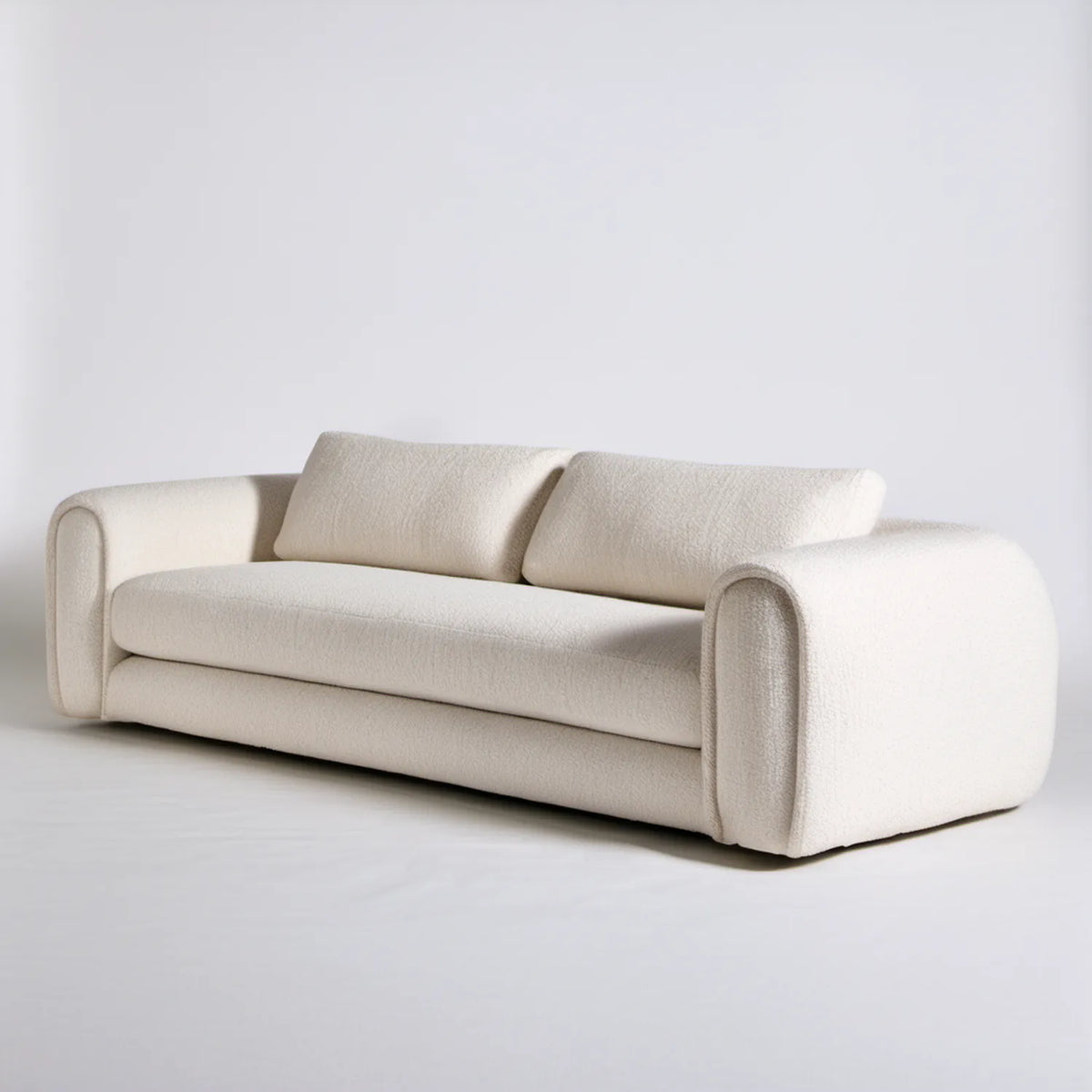 Kremowa sofa trzyosobowa z tapicerką bouclé, 220 x 95 x 75 cm